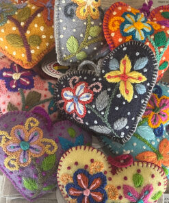 color backgorund embroidered hearts